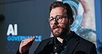 Microphone, convention and man on stage for ai governance or data science. Male speaker, seminar or conference for training, accountability and learning about future of technology at business event