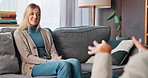 Talking, psychologist and woman on sofa in office for psychometric, evaluation and counseling . Mental health diagnosis, conversation and aptitude exam with people in clinic for support and client