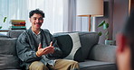Happy, talking and man on sofa with therapist for consulting, counseling and therapy session. Psychology, communication and psychologist with patient for emotional support, mental health and help