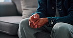 Anxiety, therapy and hands of man on sofa for fidgeting in stress, trauma or mental health session. Worry, nervous and male person stimming for panic attack, overthinking or fear at counseling clinic