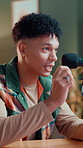 Man, influencer and live stream with review, headphones and talk with microphone, tips or product on web. Person, brand ambassador and presenter with electronics, tech or chat on social media in home