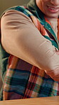 Creative, hands and man with elbow pain in office for muscle sprain, inflammation and overworked. Hurt, fibromyalgia and employee with joint massage for osteoporosis, discomfort or uncomfortable ache