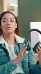 Content creator, face and woman with headphones for review, sound quality or music. Live streaming, talk and show tech for product sponsorship, promo or advertising with audiophile with pov at home