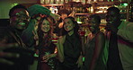 Selfie, cocktails and group of friends in club, party or social event at night for fun together. Smile, cheers and people with alcohol drinks at happy hour for photography picture for memory in pub.