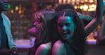 Smile, women and friends dancing at nightclub with energy, movement and rhythm at disco event. People, laugh and reunion for New Years celebration, music festival and freedom by bonding for nightlife