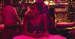 Woman, phone and waiting in night club for date, texting and frustrated thinking with cocktail. Girl, person and sad with smartphone, alcohol or drink for meeting, disappointed and stood up at bar