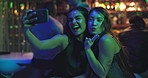 Smile, women and friends with selfie at nightclub for photography, social media post and reunion. People, laugh and peace sign for profile picture update, memory and bonding together for night out