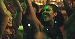 Dancing, women and friends in club, night or celebration for New Year, group and confetti for party. Happy, people and fun for festive season, concert or energy for social event, excited and together