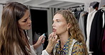 Woman, makeup artist and backstage with lipstick application for preparation. Behind the scenes, cosmetics and model getting ready with stylist for touch up or fashion photoshoot in production studio