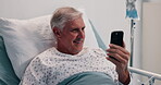 Hospital, bed and man with smartphone, video call and communication for update on condition or chat. Healthcare, elderly person and virtual conversation with mobile app, laugh and recovery in clinic