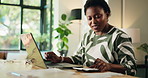 Finance, remote work and black woman on laptop with calculator for accounting, profit or budget. Computer, home and freelancer typing with tax invoice, bookkeeping and happy for positive cashflow