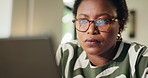 African woman, laptop and reading for remote work from home with editing, review or project management. Person, copywriting and feedback by pc with glasses for article, contact or creative at house