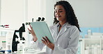Woman, scientist and tablet for chemistry in lab for research, medical study and online results. Person, microscope and checklist for experiment, review feedback and discovery report of vaccine trial