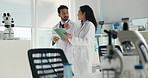 Collaboration, scientist and people with tablet, lab and discussion for medical research and online. Healthcare, man and woman with tech for data analysis, pharmaceutical and teamwork in clinic