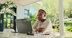 Laptop, teacher and video call with black woman in home for distance school, webinar and meeting. Online class, elearning and quiz guide with person and earphones for virtual lesson, help and chat
