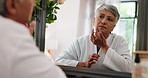 Mature woman, spa and mirror with skincare for anti aging or facial treatment at beauty salon. Senior, female person or touch with reflection or robe for hygiene or dermatology at luxury resort