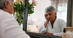 Mirror, senior woman and sad with skincare, anti aging and cosmetics results. Pensioner, depression and elderly lady with reflection, grooming or treatment fail for wrinkles or dermatology in house