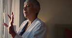 Coffee, curtains and morning with old woman in hotel room for accommodation or hospitality. Drink, smile and wake up with happy senior person at lodge or resort for holiday, travel and vacation