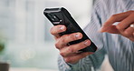 Hands, phone and text message with business person in office for communication, scrolling or update. App, browsing and social media with employee in workplace for contact, ecommerce or research