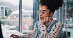 Computer, reading and thinking with business woman in office for online report or research. Glasses, information and typing with African employee in city workplace for planning or problem solving
