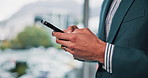 Hands, phone and text message with employee person in office for communication, typing or update. App, browsing and social media with business man in workplace for contact, ecommerce or research