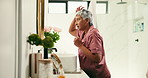 Cosmetics, mature woman and check hair in mirror for hydration treatment, natural beauty and results. Reflection, person and happy with morning routine inspection for grooming and haircare in home