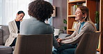 Happy couple, discussion and counseling with therapist for relationship, love or understanding. Man, woman or lovers talking with counsellor in therapy session for conflict resolution, help or advice