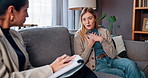 Notes, therapy and women with anxiety, stress and consultation for recovery support and mental health. Counselor, psychologist and clipboard in conversation for trauma, depression or explain crisis