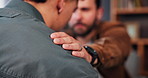 Empathy, therapist and patient in office, mental health and listening to trauma, counseling or help. Consultation, men and psychologist with support for client, talking and appointment for therapy