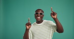 Sunglasses, man and dance in studio for celebration, success or victory. Energy, excited and African person moving to music for good news, achievement and winning competition on background with space