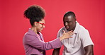 Dancing, energy and couple in studio, love and bonding together on red background. People, creative and man with woman, romance or skills with relationship, support and learning with artist or talent