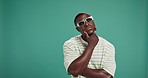 Fashion, thinking and black man with sunglasses and casual, trendy or cool outfit with confidence. Mockup space, planning and African male person with ideas for edgy style by studio background.