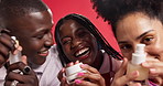 Friends, beauty product and face of people with skincare for advertising, marketing and brand promotion. Self care, happy or women and man show cosmetic container on red background for dermatology 