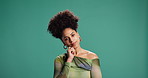 Face, solution and thinking with black woman on green background for brainstorming or inspiration. Idea, strategy and vision with African person in studio for decision, planning or problem solving