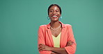 Face, fashion and black woman in studio, arms crossed and confidence personality on green background. African person, designer and happy model with pride, career ambition and stylish clothes