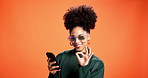 Woman, ok sign and smile with phone in studio with sunglasses, texting and good service by background. African person, happy and smartphone on mobile app, deal and mock up space for social media