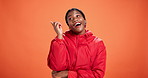 Memory, thinking or black woman in studio for cool clothes, answer or problem solving. Future, mockup space or African female person on orange background with eureka moment, solution or fashion ideas