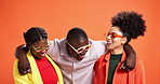 Happy, fashion and friends hugging by studio background with colorful, trendy or cool outfit. Sunglasses, smile and group of African people embracing with funky, edgy or creative style together.