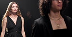 Runway, catwalk and models at fashion show with designer collection for luxury trendy outfit. Fabric, industry and people at couture event with black clothes for formal, elegant or fancy style.