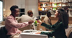 Couple, dating and cheers in restaurant with wine for toast, romance or anniversary celebration. Hospitality, conversation and fine dining with man, woman and romantic dinner for valentines day