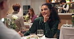 Bonding, couple and people with wine, restaurant and celebration for anniversary, talking and smile. Happy, woman and conversation with man on break, romance and beverage for fine dining or dinner