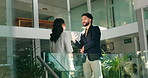 Business, people and talk in meeting in lobby for planning, feedback and advice of financial project. Woman, man and discussion of schedule update, explain ideas and teamwork for investment procedure