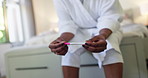 Pregnancy test, waiting and hands of woman in home with anxious for results with medical kit. Health, maternity and nervous person with stick on bed for fertility success, ivf treatment or surprise