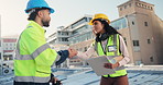Handshake, construction and teamwork with people in city for building, inspection and deal. Architecture, infrastructure engineer and project agreement with contractors for property development