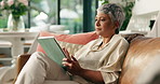 Senior woman, sofa and browsing with tablet for research, news article or ebook at home. Mature, female person or user with technology or app for internet or network connection in retirement house