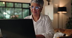 Laptop, freelancer and mature woman in home office for editing report and news. Computer, hybrid work and happy person online with positive review, journalism and editor in chief reading article