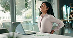 Back pain, finance and laptop with business woman at desk in office for online report or research. Injury, posture and spine with professional accountant at work on computer for financial management