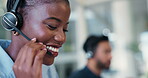 Call center, woman and discussion in office with customer support, communication and online consultant. Coworking, headset and technical service help, crm or advice for assistance hotline or agency