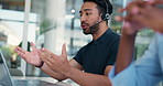 Laptop, support and typing with man in call center for advice, online help or virtual assistance. Computer, conversation and feedback with coworking agent in workplace for contact or customer service