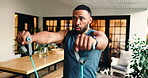 Fitness, resistance bands and man with workout in home in morning for arm muscle training. Health, wellness and male person with exercise equipment for warm up with recovery stretching in apartment.